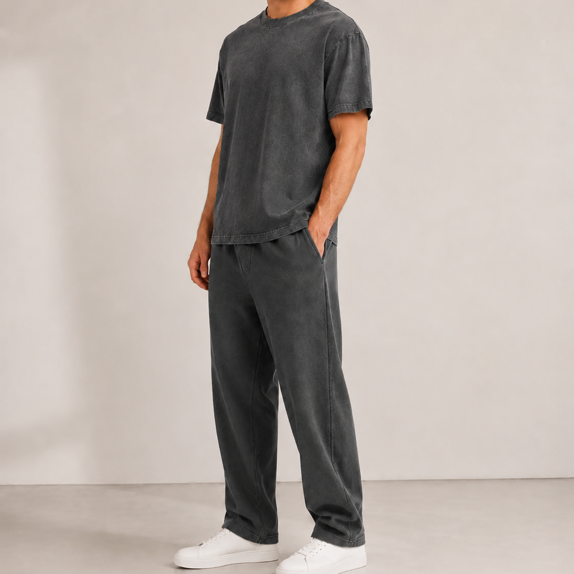 Model wearing the Washed Black Vintage Washed T-Shirt with matching sweatpants and white sneakers